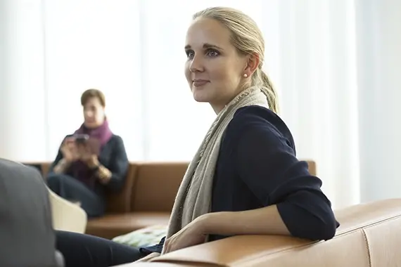 Woman sitting on a couch