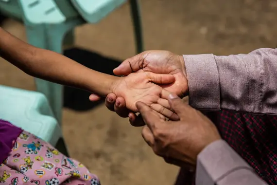 Handshaking between two people