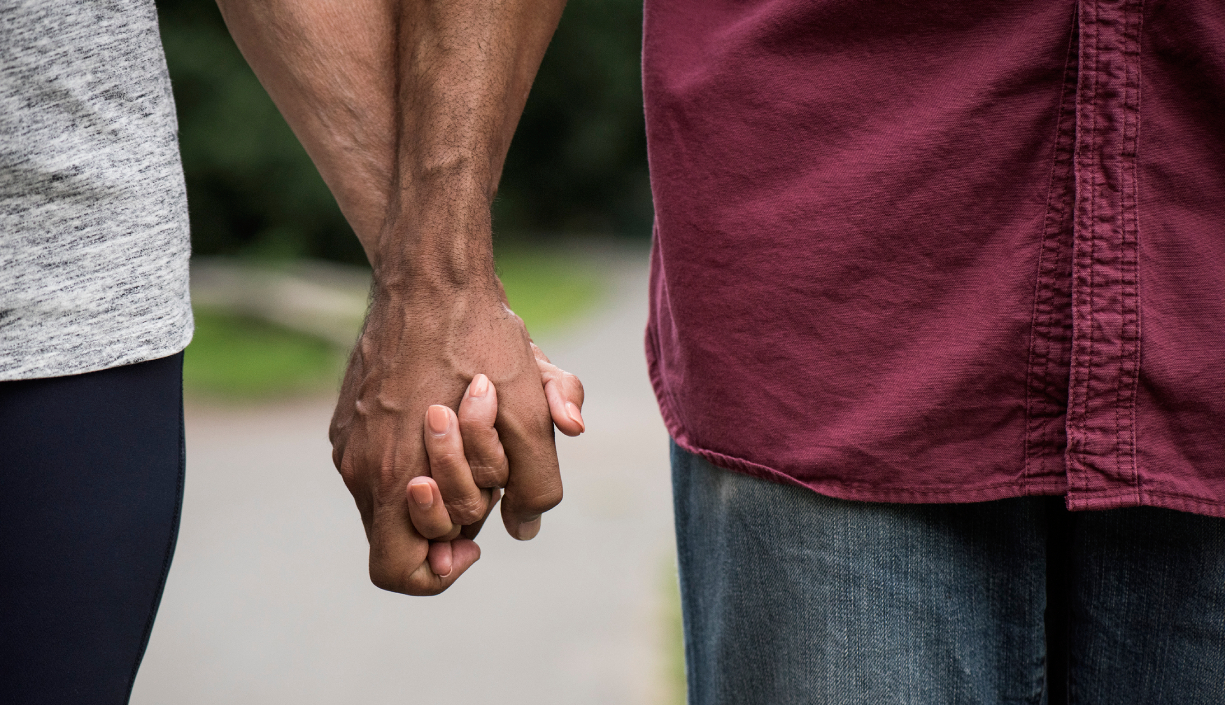 A couple holding hands