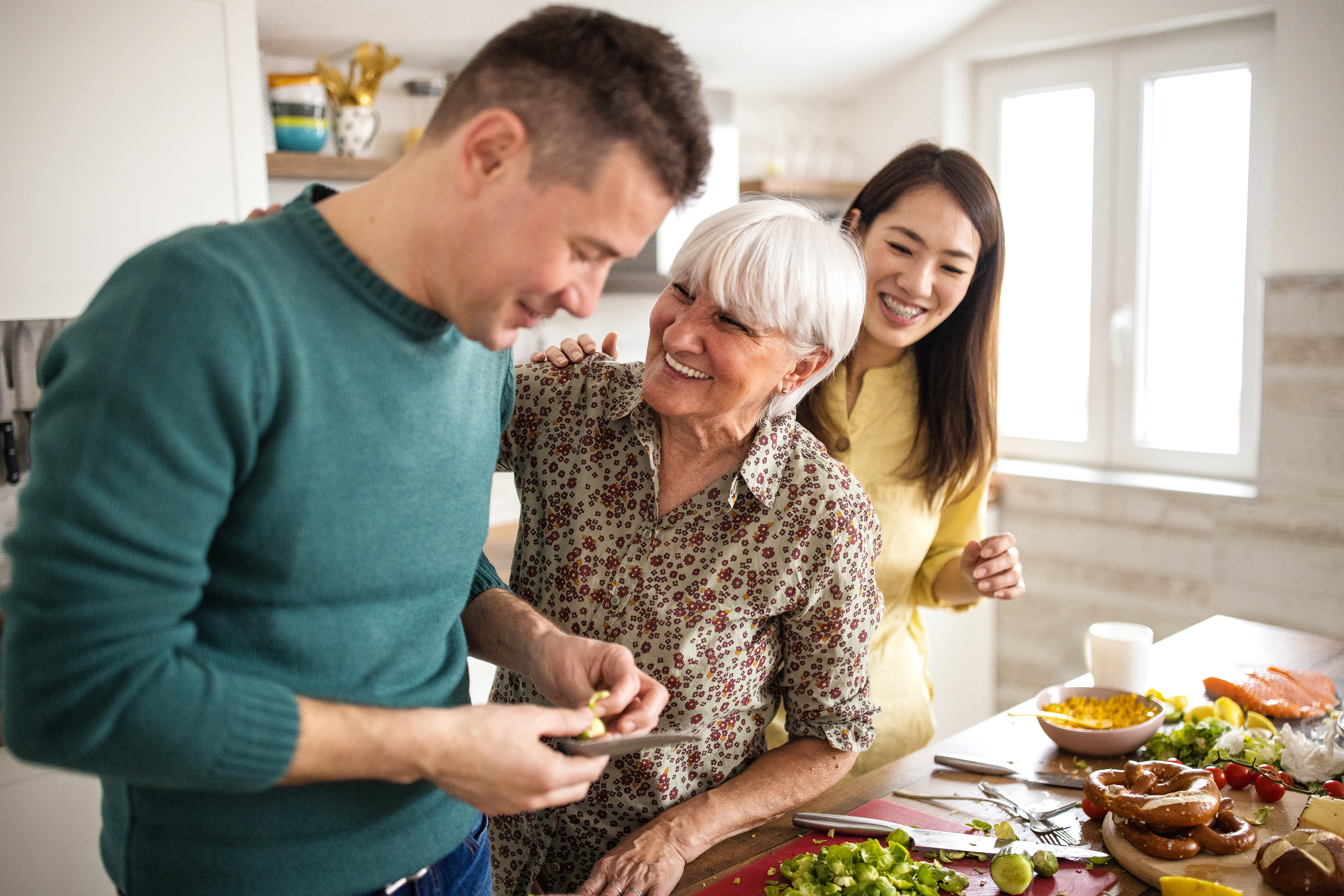 family having fun preparing food