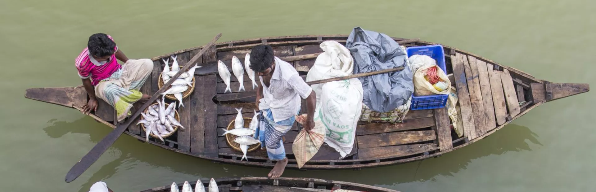 Fishers on a boat in Bangladesh