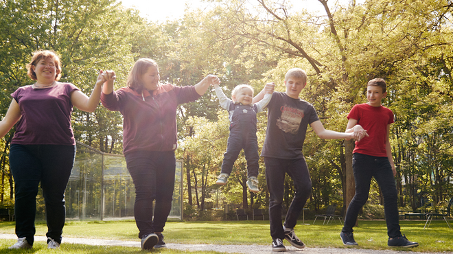 Group of people walking in park