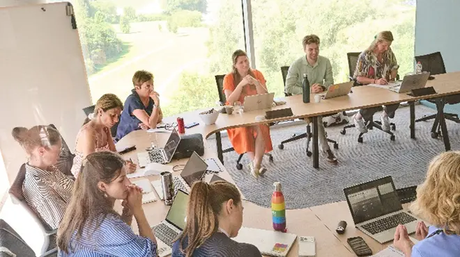 Group of employees during in meeting in a modern office