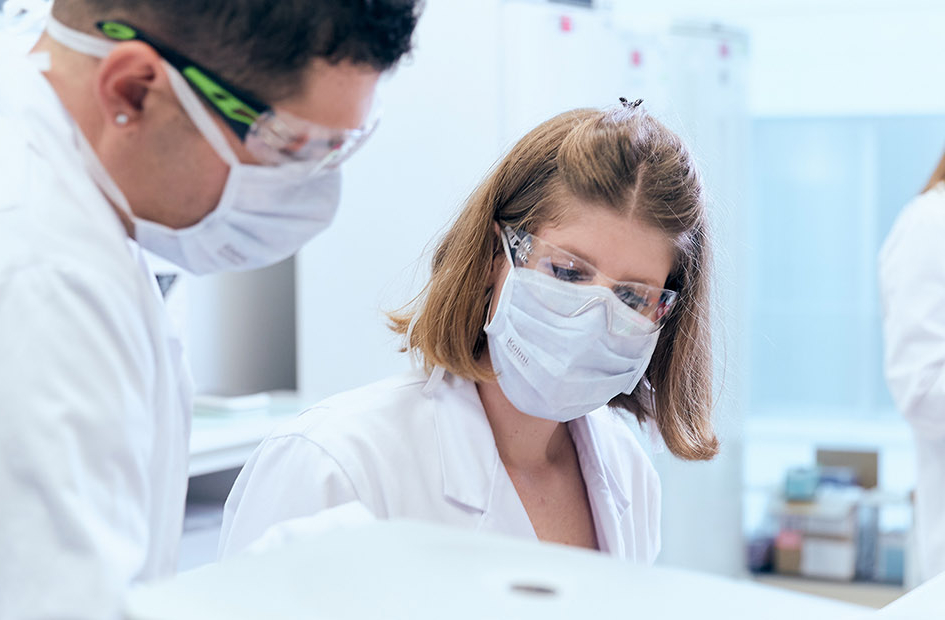 A pair of doctors looking at something