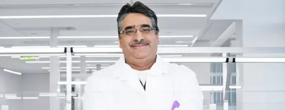 Scientist in lab smiling