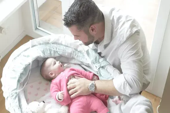 Michael sharing precious moments with his new son