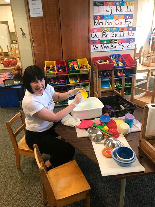 Woman washing dishes