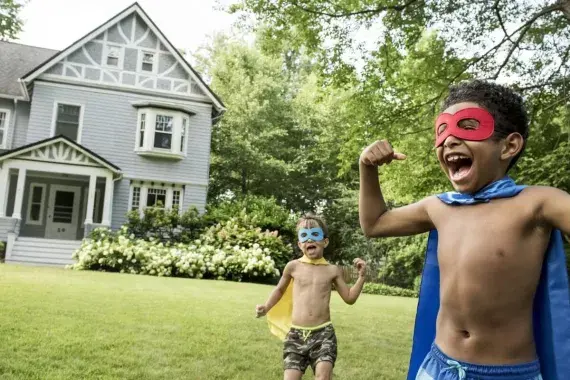 Two boys playing outdoors 