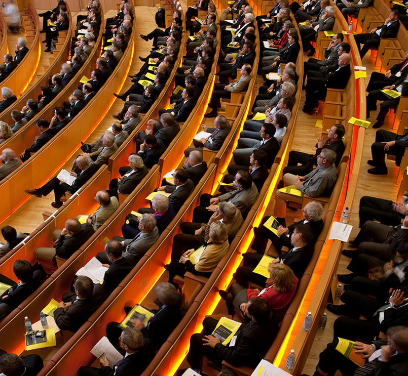 Vue du public dans un auditorium lors d'une conférence