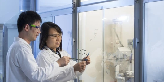 woman and man in lab image