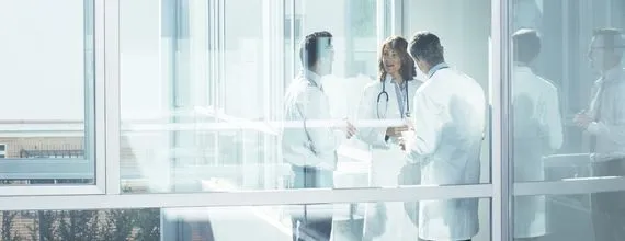 Doctors are discussing in a medical facility