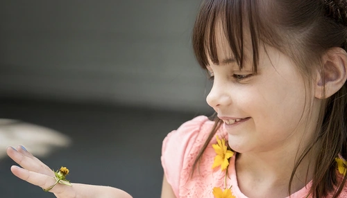 A girl with a flower