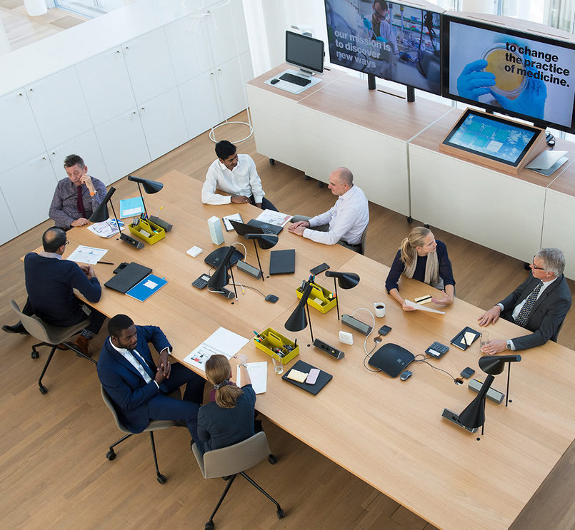 A photo of people in a meeting hall