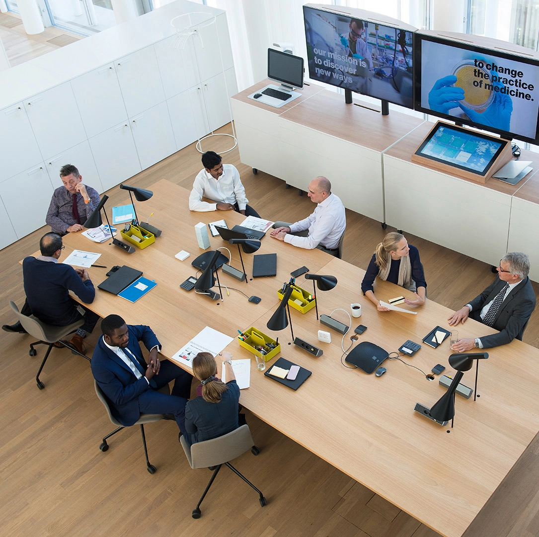 A photo of people in a meeting hall