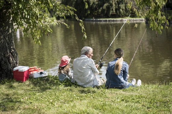 Man and children fishing