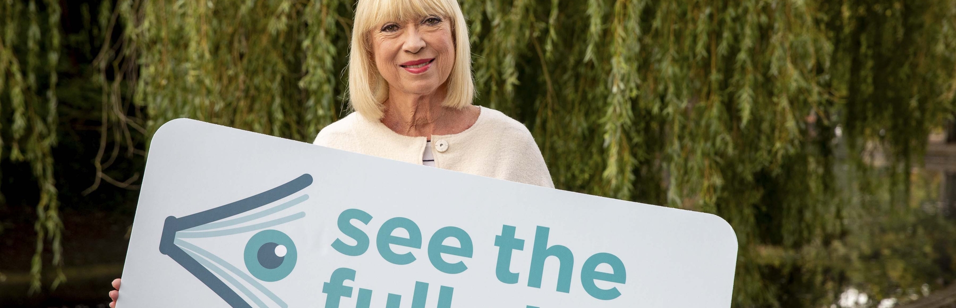 Blurry image of Anne Doyle at launch of AMD awareness week