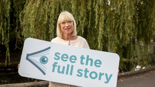 Blurry image of Anne Doyle at launch of AMD awareness week