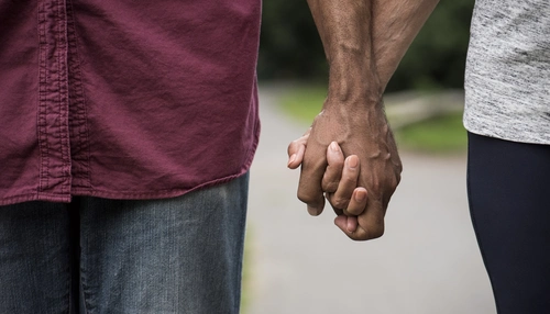 A couple holding hands