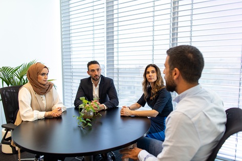 Colleagues having a discussion at work