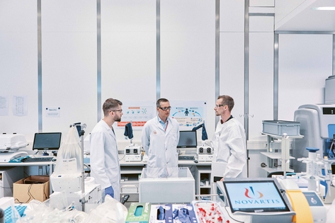 Scientists discussing at the lab