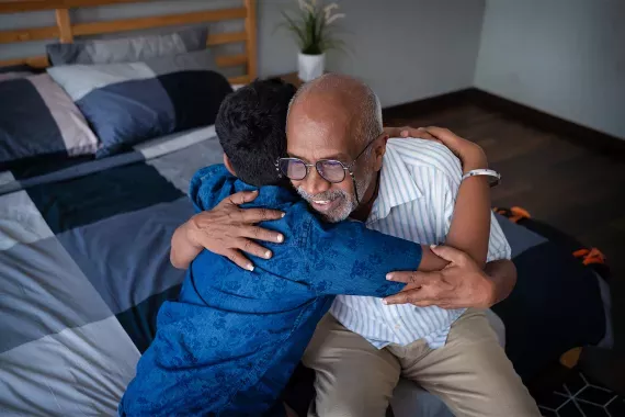 grandfather-grandson-hugging