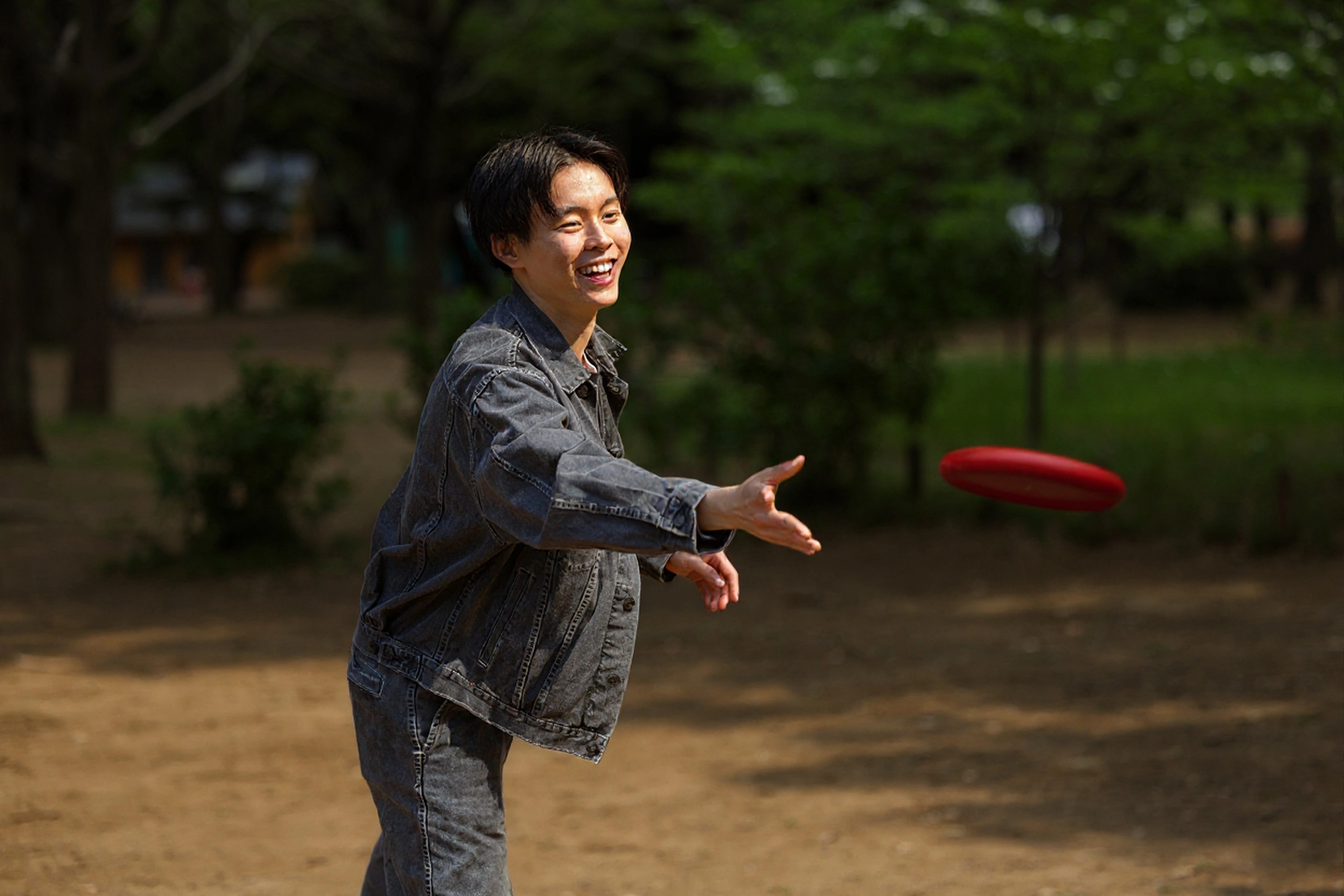 Playing frisbee outdoors during daytime