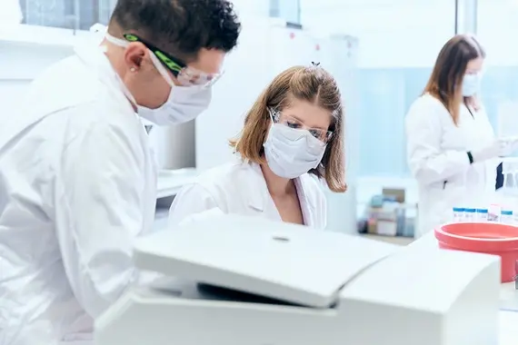 three-scientists-working-in-a-mordern-lab