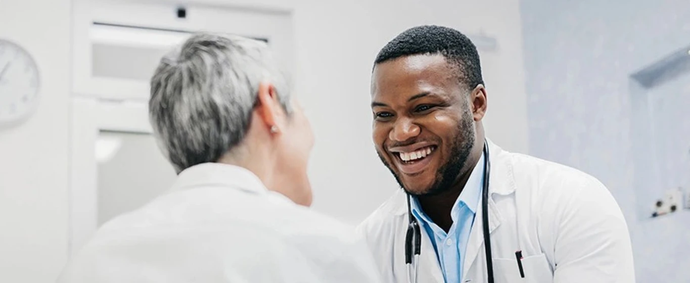 hcp-and-patient-smiling-in-medical-office-v2