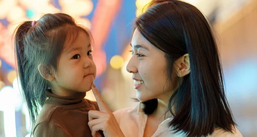 Parent and child enjoying a night out-1