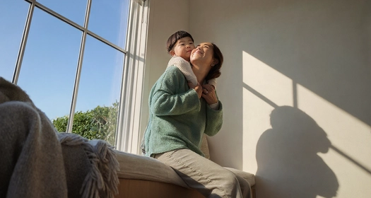 patient-enjoying-sunlight-by-the-window-with-shadow-play