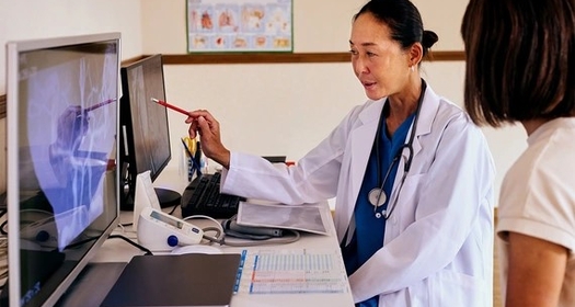 doctor-explaining-a-scan-to-their-patient-media-content
