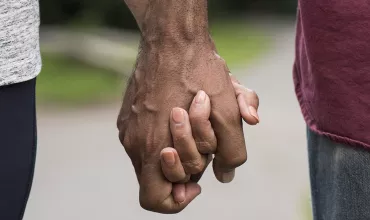 A couple holding hands