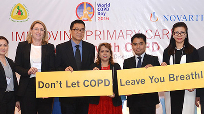 Novartis supports Filipino pulmonologists call for improving care for women with COPD Group photo of 8 holding signboard with tex Don't let COPD leave you breathless