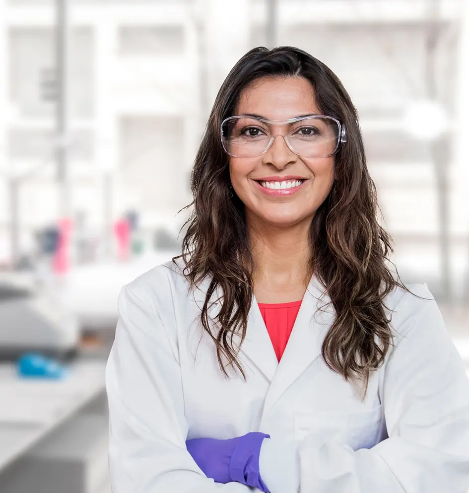 Banner About Novartis, photo of woman scientist