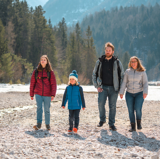 Family hiking in mountains