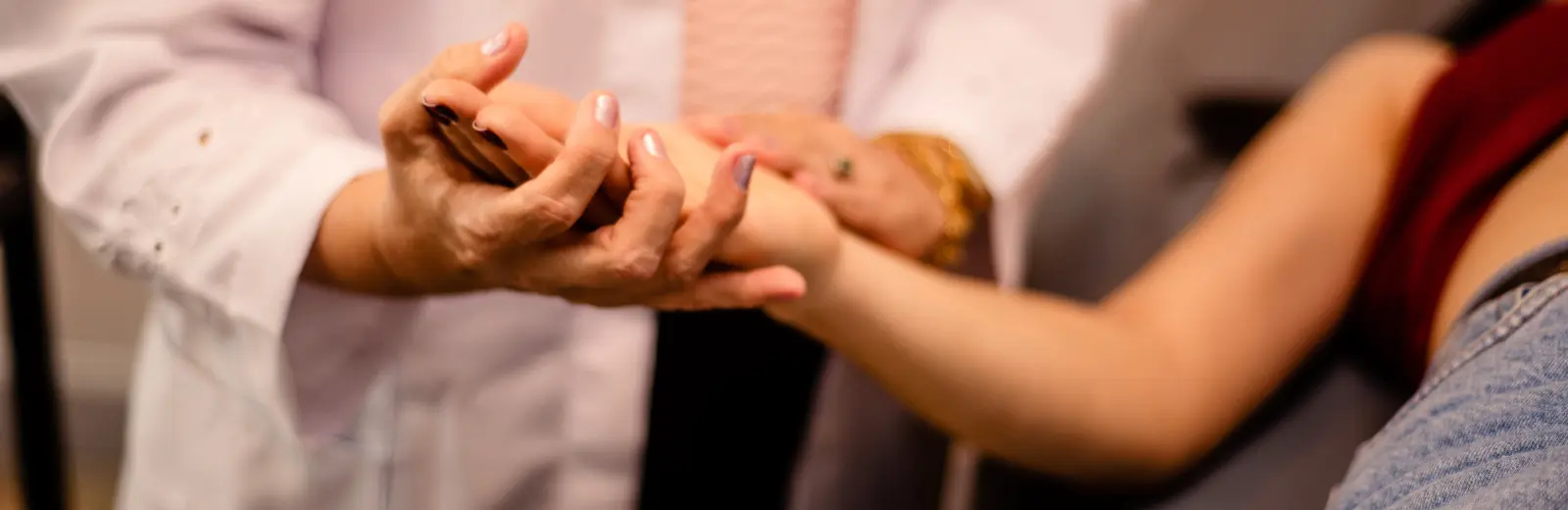 Doctor performing skin exam