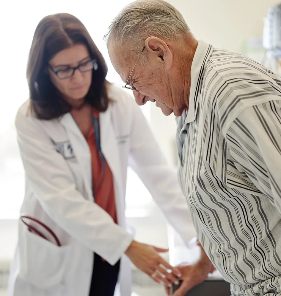 Elderly gentleman having a check-up at the doctor