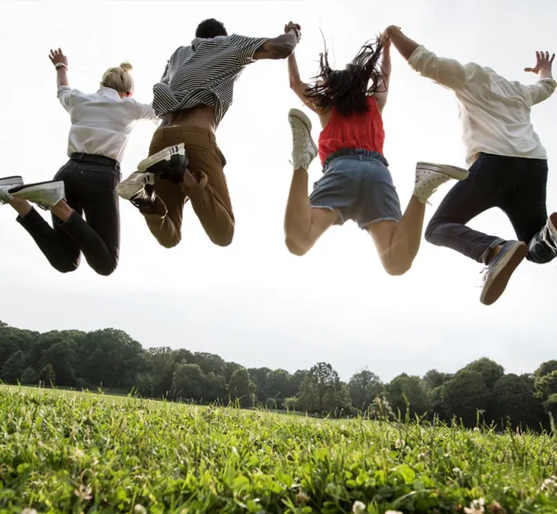 Group of young people jumping