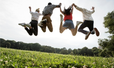 Group of young people jumping