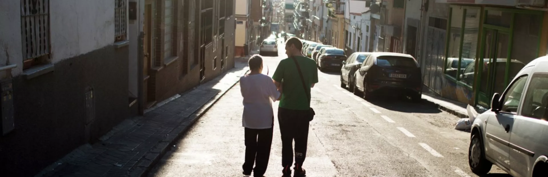 Juan Pedro García Hernández and his mother go for a walk in their neighborhood.