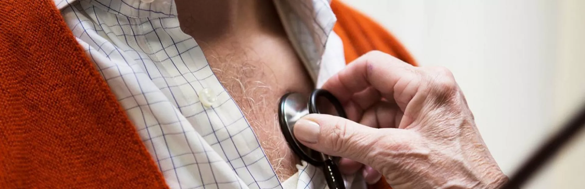 Heart failure patient receives care from his doctor