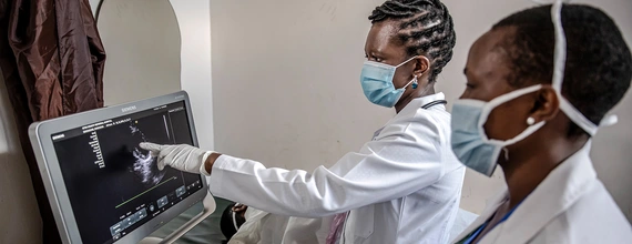 Doctors discussing ultrasound investigation