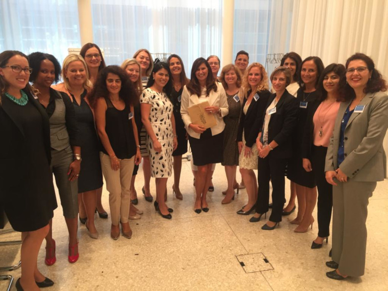 Schaffert with other attendees after a speech at a women’s leadership program