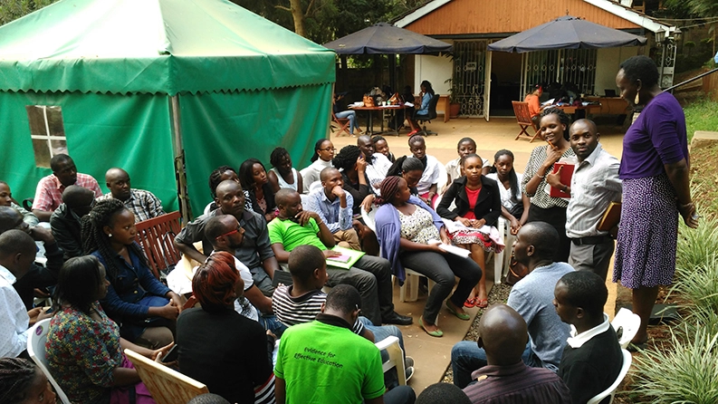 Professor Monica Onyango of Boston University speaking to survey field officers.