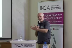 Ron Hollander, president of the International Neuroendocrine Cancer Alliance, speaking at an event
