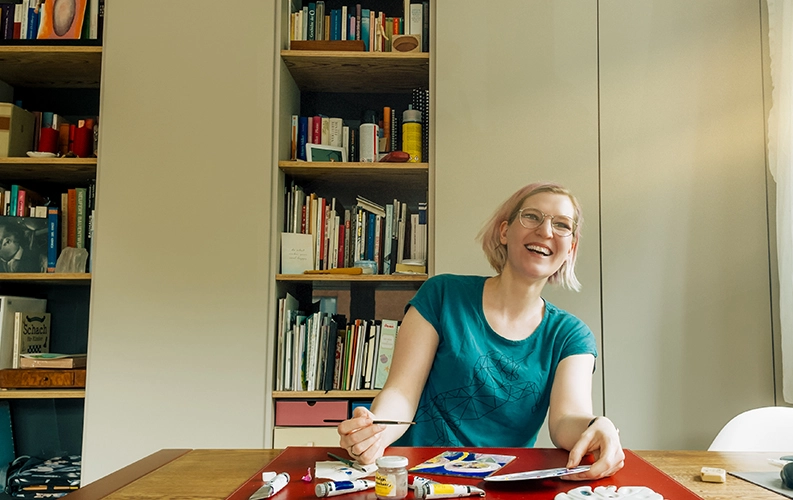 ITP patient smiling and painting