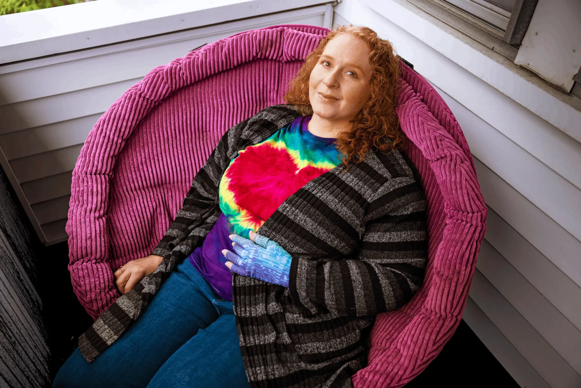 Laurie at home on her porch