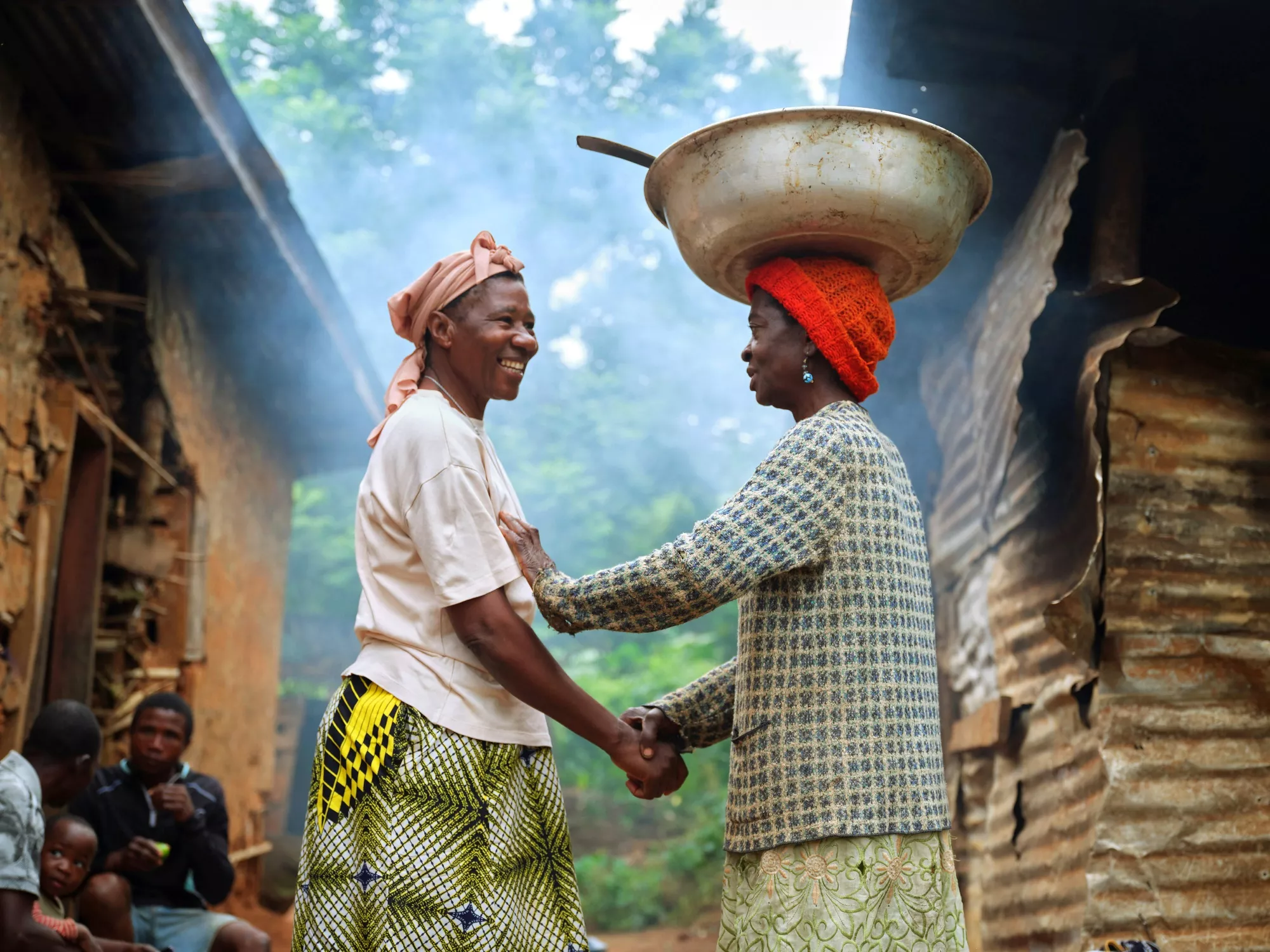 Sister Martine visits Adèle Biloa Ngah (right) in Ntui.