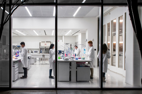 Scientists working in the lab at night