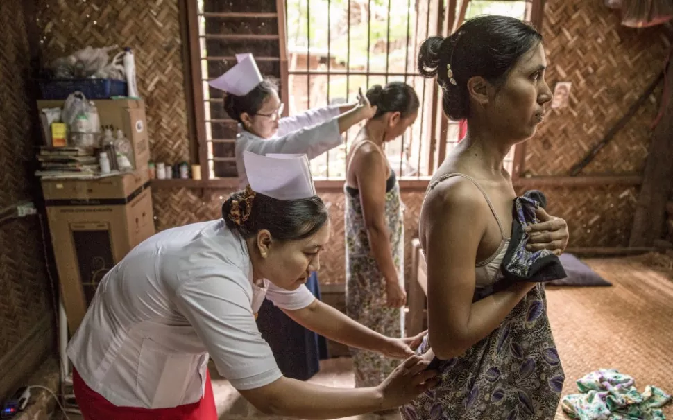 Ladies screening for leprosy in Myanmar